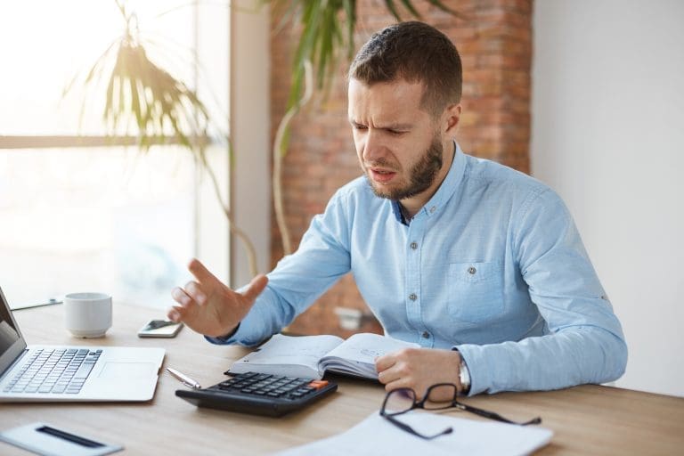 Casino Bankroll Management — <a href="https://www.freepik.com/free-photo/portrait-unhappy-mature-bearded-accountant-working-company-office_8225516.htm">Image by cookie_studio</a> on Freepik